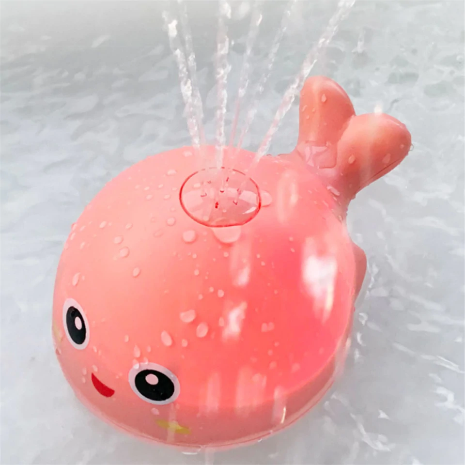 Spriccelő delfin fürdőjáték LED világítással